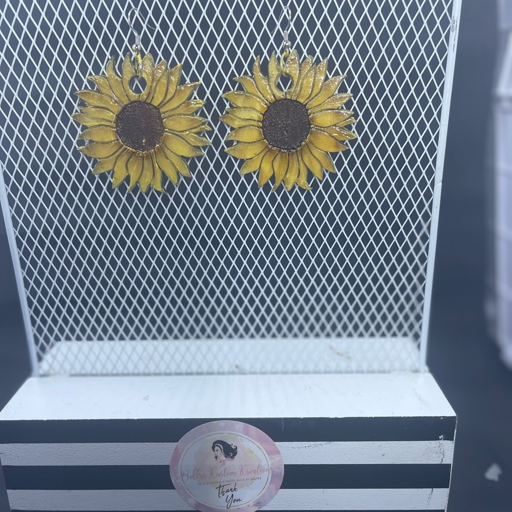 I have hand made brand new sunflower earrings.